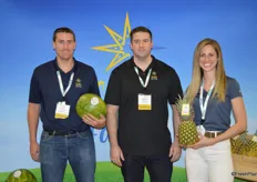 The team of Stella Farms proudly shows watermelon and pineapple. From left to right are Austin Mackey, Michael Martori and Chloe Albright.